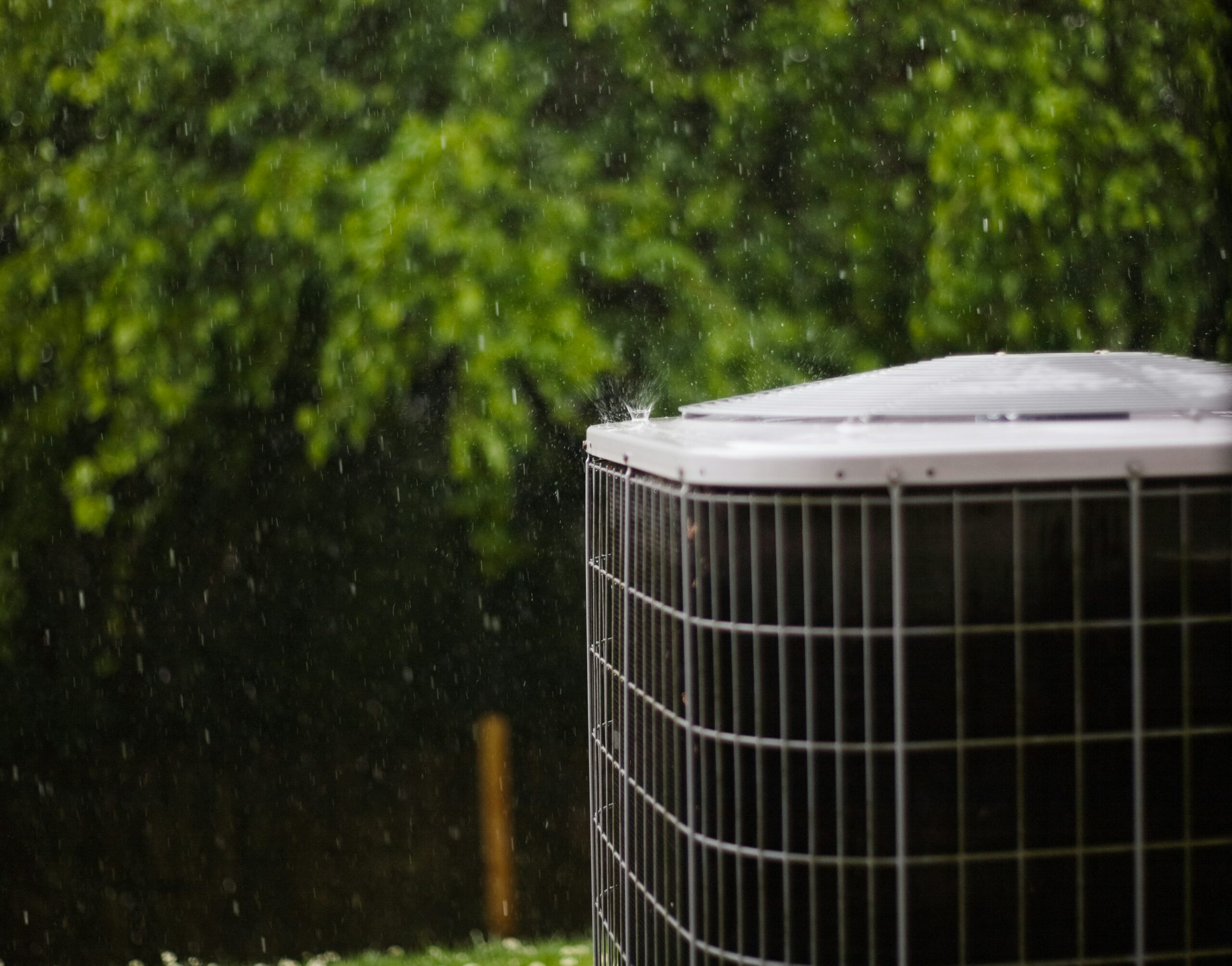 outdoor hvac system next to trees